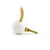 DSC 3696 gold rabbit and white glass knob